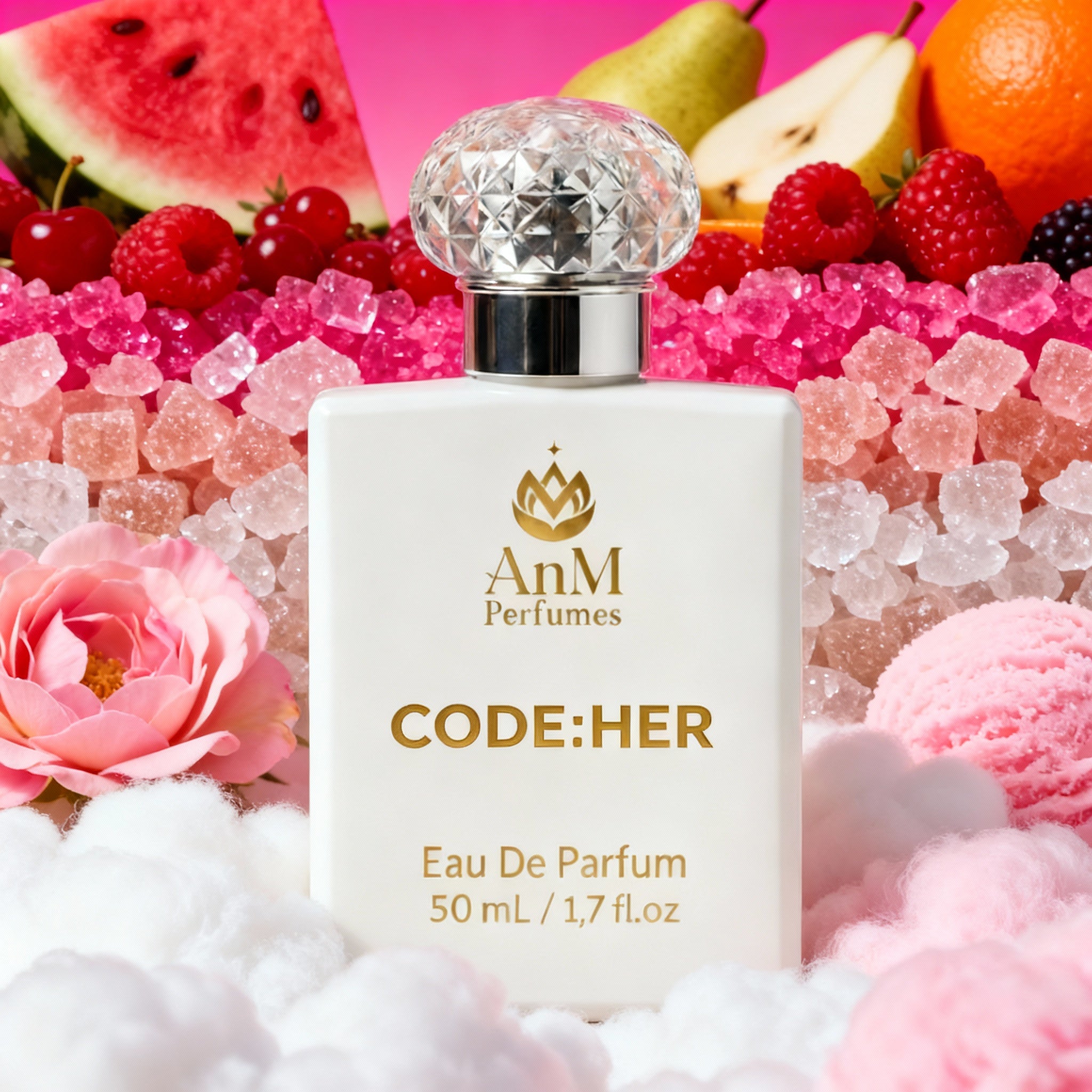 AnM Perfumes CODE:HER perfume bottle with fruits, flowers, and candy in the background