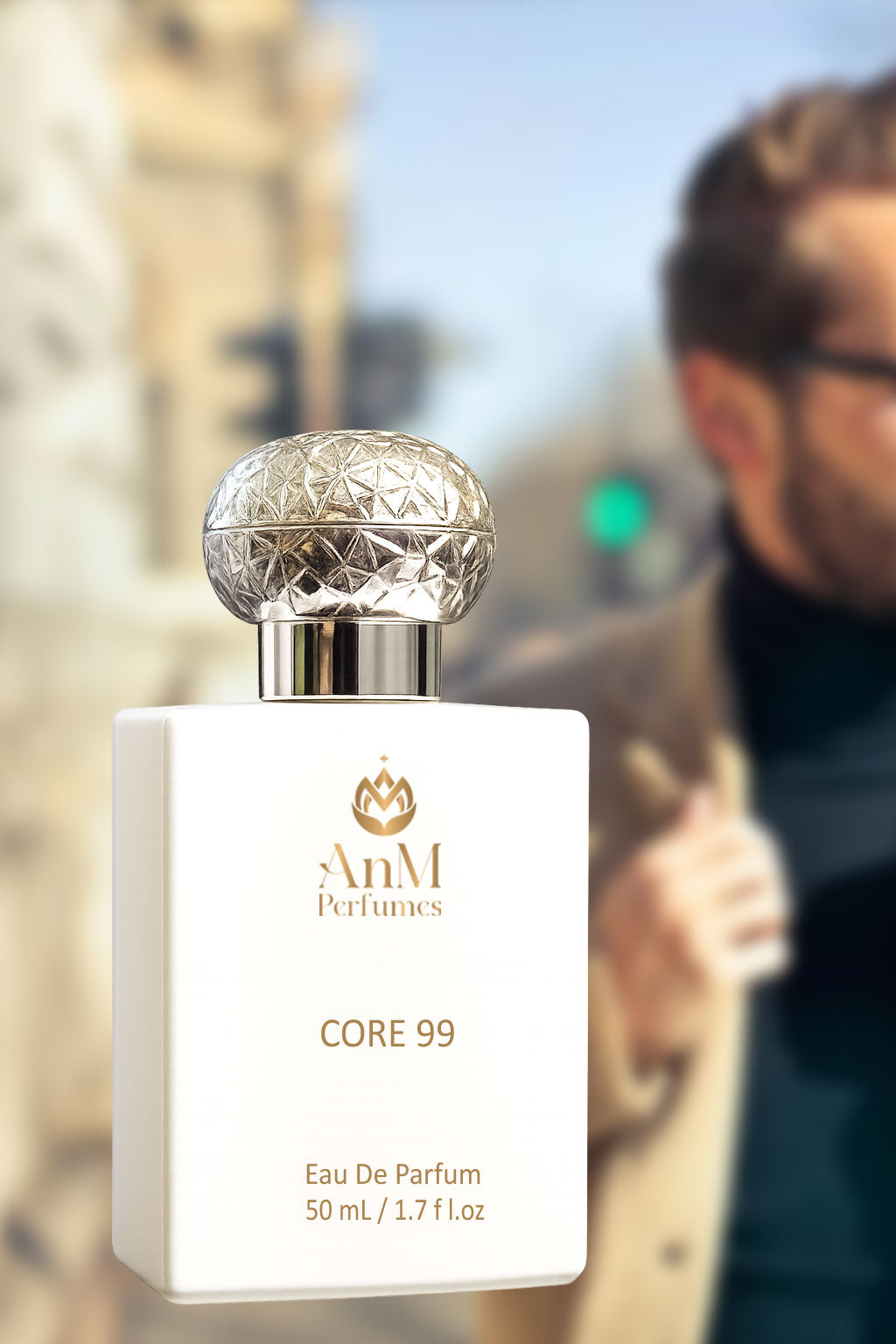 AnM Perfumes CORE 99 Eau De Parfum bottle held by a person with a blurred cityscape background