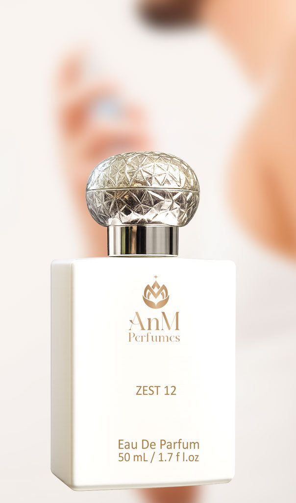 AnM Perfumes ZEST 12 Eau De Parfum bottle with silver cap on a blurred background
